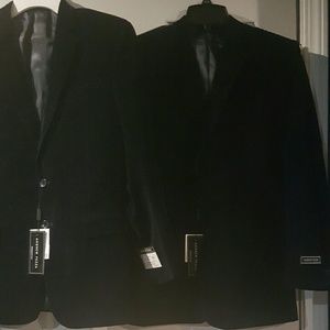 Two navy blue Andrew Fezza suit jackets